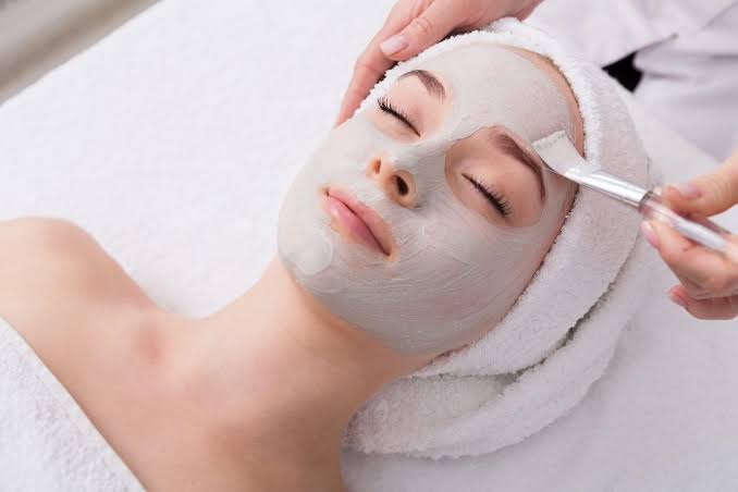 Guest receiving a head massage